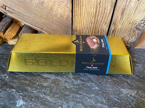 Goldkenn Goldbar Verpackung und Pralinen