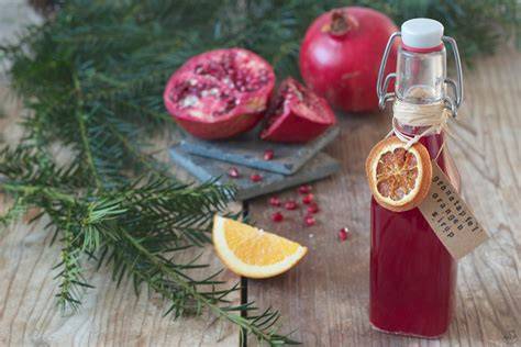 Granatapfel- und Orangen-Sirup Kochen