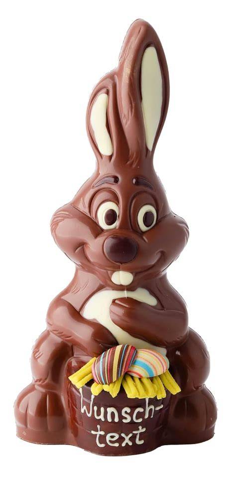 Gussform und Füllung von pinkfarbener Schokolade, bemalter Schoko-Osterhase