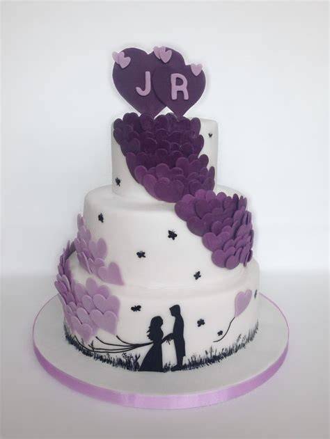 Herzen aus Fondant als Namenskekse zur Hochzeit