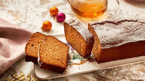 Honigkuchen mit Schokoglasur und Nüssen