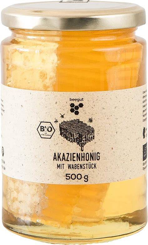 Honigwabe mit flüssigem Akazienhonig