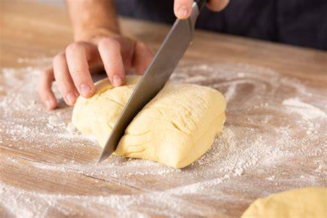 Infografik der Rezeptschritte: Teig - Füllung - Backen - Schneiden