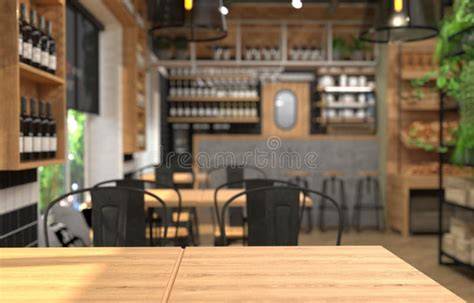 Innenraum des Cafés, Theke mit Croissants und Getränken, gemütliche Sitzplätze