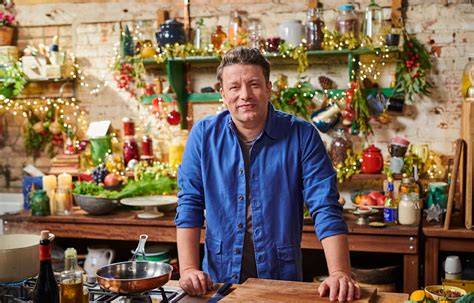 Jamie Oliver beim Kochen eines Honiggerichtes