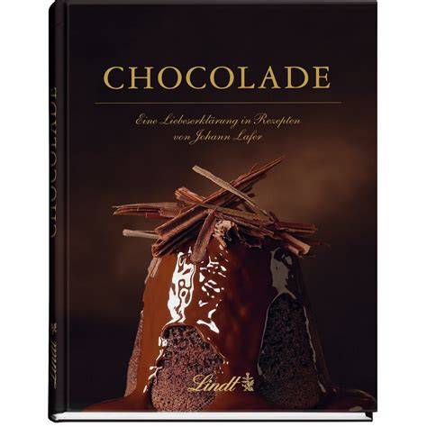 Johann Lafer Schokoladen-Kochbuch „Chocolade“ neben Zutaten und Lindt Tafeln