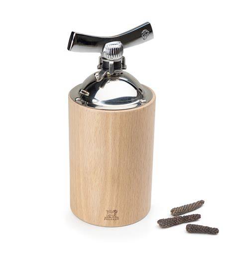 Kardamom-Mahlvorgang mit Isen-Mühle