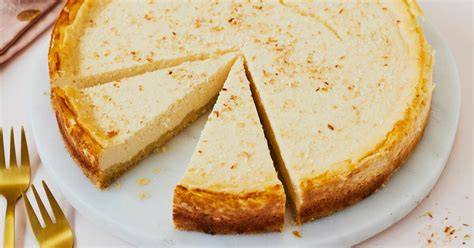 Kokos-Käsekuchen mit knusprigem Streuselboden und Kokostopping