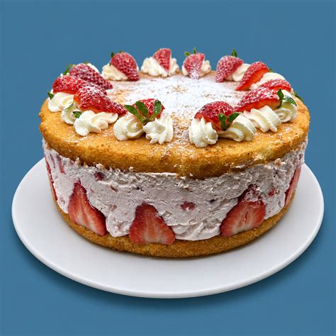 Kuchenstück, Sahne und frische Rhabarberstücke