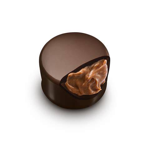 LINDOR Genussmoment - aufgebrochene Praline mit cremiger Füllung