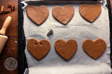 Lebkuchenherzen im Backofen, traditionelle Herstellung