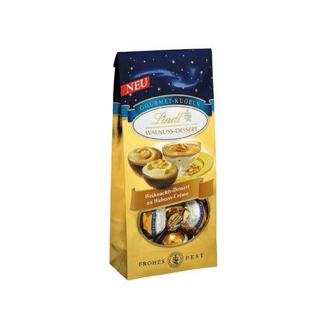 Lindt Bratapfel-Vanille Kugeln, offene Geschenkverpackung, Produktfoto