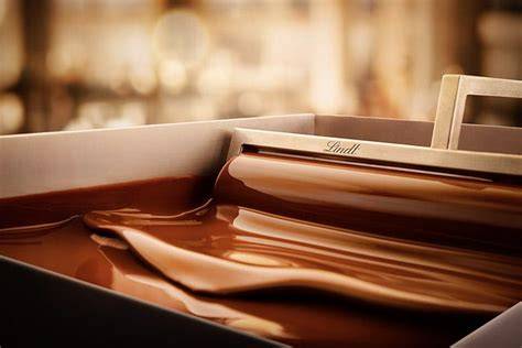 Lindt Conche und Kakaobohnen
