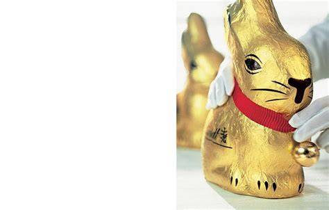 Lindt Goldhase in Goldfolie mit rotem Band