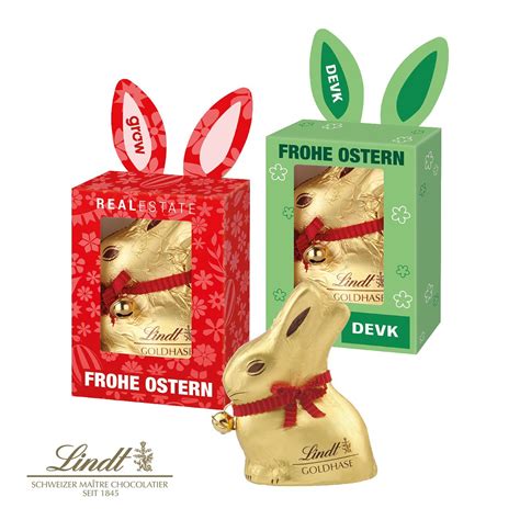 Lindt Goldhase in individueller Werbekartonage mit geöffneten Hasenohren