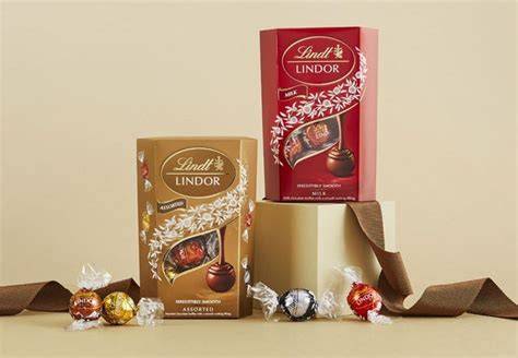 Lindt LINDOR Pick & Mix Adventskalender illustriert mit Kugeln der verschiedenen Sorten