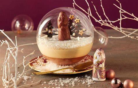 Lindt Walnuss Dessert Kugel geöffnet mit sichtbarer Füllung und Nussstückchen