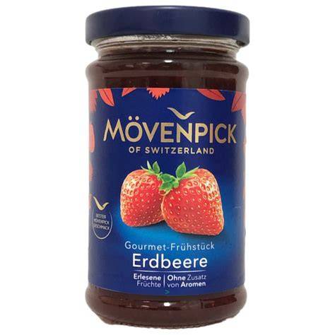 Mövenpick Glas Marmelade auf Frühstückstisch