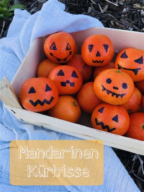 Mandarinen als Mini-Kürbisse auf Halloween Nachtisch