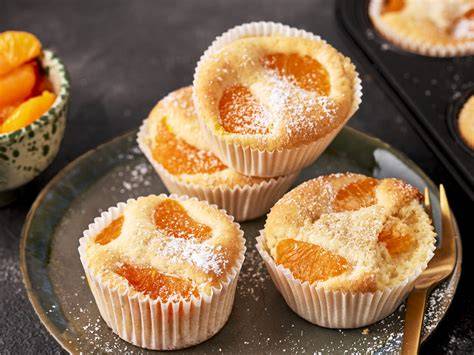 Mandarinen-Muffins mit Schmetterlingsdekor