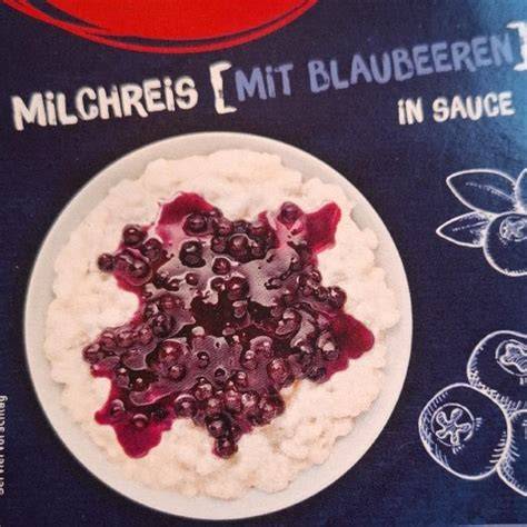 Mango-Kokos-Milchreis mit Blaubeeren