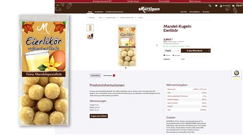 Marzipan Eierlikör Kugeln auf Holzbrett, dekorativ arrangiert