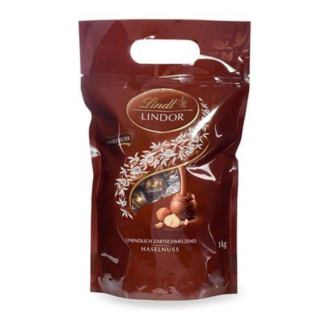 Milchschokolade und Haselnuss - Schnittdarstellung der LINDOR Kugel