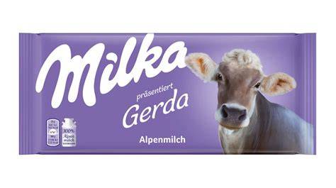 Milka Alpenmilch Schokolade mit der ikonischen lila Kuh