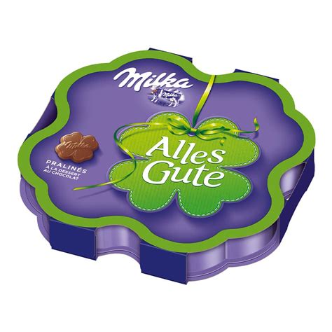 Milka Pralinés in Kleeblattform und Geschenkverpackung