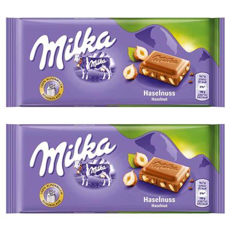 Milka Schokoladentafel mit Nougatfüllung und ganzen Haselnüssen