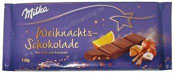 Milka Weihnachtsschokolade Verpackung und Kugeln