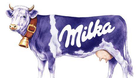 Milka lila Kuh mit Alpenkuhglocke