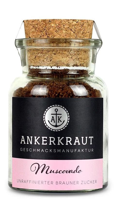 Muscovado-Zucker: braune, feuchte Körner im Glas