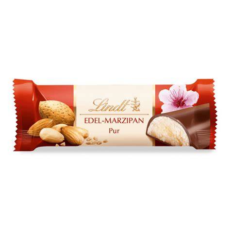 Nahaufnahme Lindt Edel Marzipan Kugel: Mandelkern und Schokoladenüberzug