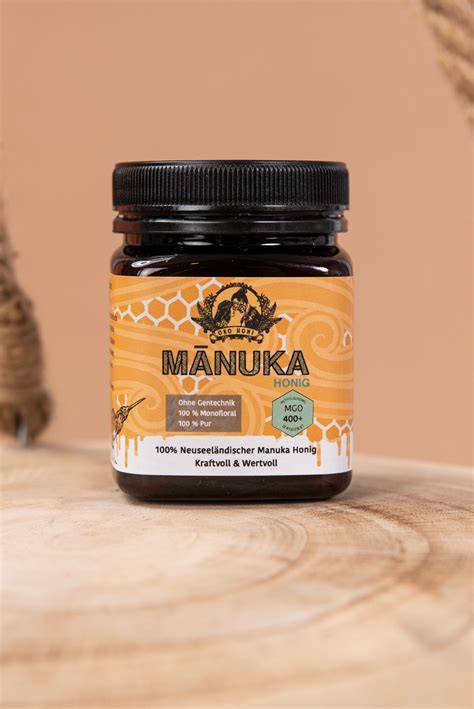 Neuseeländischer Manuka-Strauch und Honigglas
