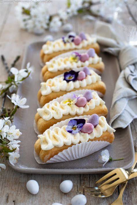 No Bake Ostertörtchen mit Mascarponecreme dekoriert mit Schokoeiern und Blüten
