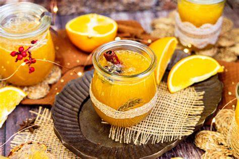 Orangen auspressen und Marmeladengläser sterilisieren