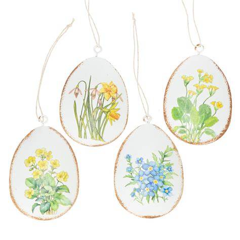 Oster-Arrangement: Hasenkekse, Ostereier, Frühlingsblumen