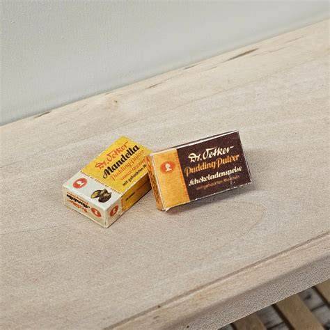 Packungen von Puddingpulver und Cremepulver