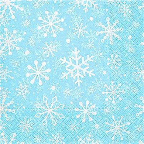 Party-Tisch im Frozen-Stil mit Servietten und Schneeflocken
