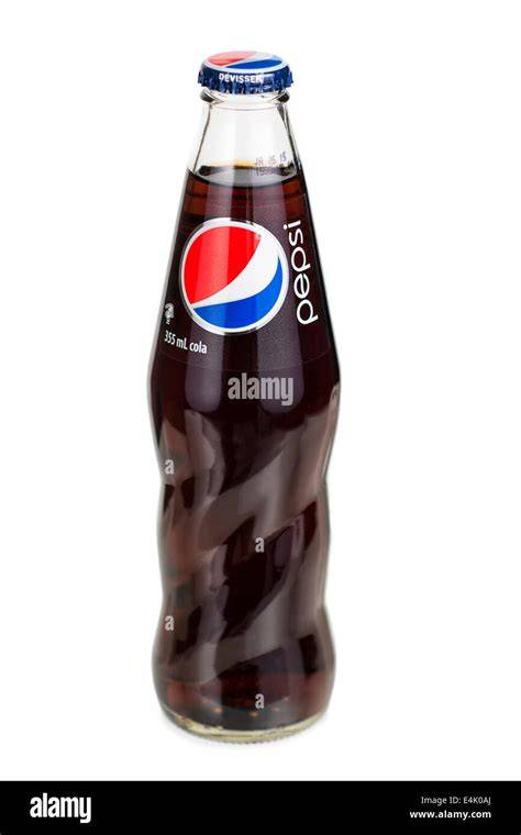 Pepsi-Flasche und Zuckermesslöffel
