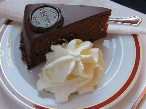 Portrait von Franz Sacher und frühe Darstellung der Sachertorte
