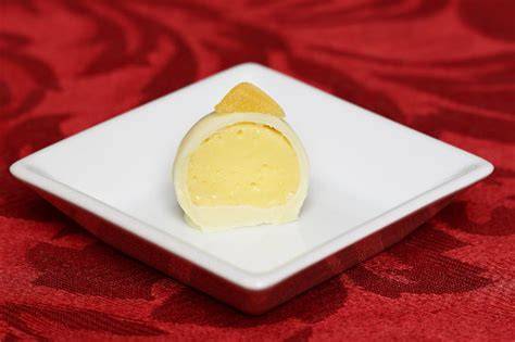 Praline-Querschnitt: Champagner-Füllung vs. Marc-de-Champagne-Füllung