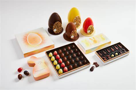Pralinenauswahl verschiedener Marken: Godiva, Neuhaus, Pierre Marcolini