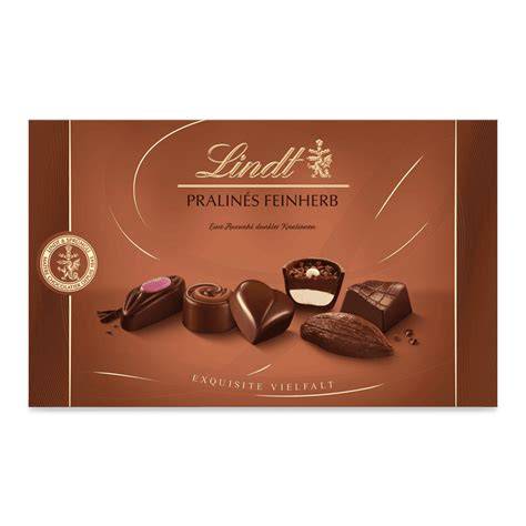 Prospekt-Cover und Lindt Pralinés 200g mit Preisangabe 7,99 €