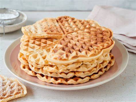 Quarkwaffeln ohne Butter mit Puderzucker