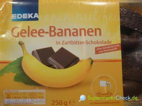 Querschnitt: Mürbeteigboden, Gelee, Marzipanschicht, Schokoladenüberzug