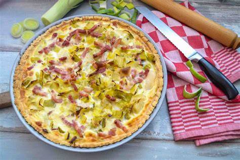 Quiche mit geschmolzenem Tessiner Käse und Speck