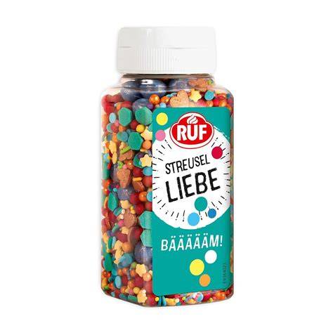 RUF Buchstaben Streusel auf einem Kuchen, bunte Dekoration