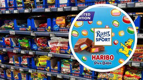 Regal mit Alternativ-Süßwaren (Ritter, Lindt, Haribo)